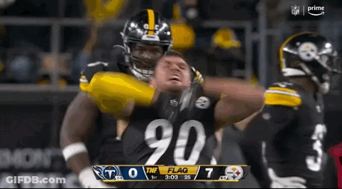 Group Of Football Players Standing On Field GIF