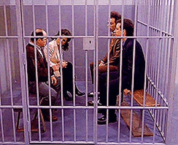 Group Of Friend Talking Inside The Jail GIF