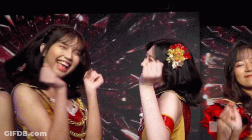 Group Of Girls Dancing Laughing At Screen Saying A GIF