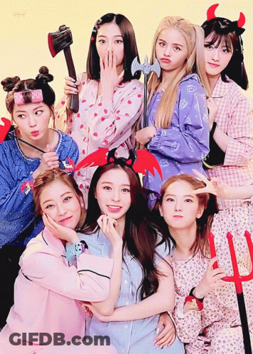 Group Of Girls Posing With Devil Costume GIF
