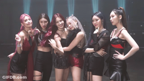 Group Of Girls Posing With Korean Writing GIF
