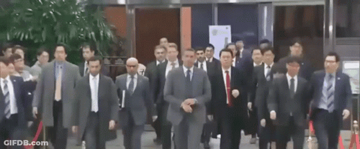 Group Of Lawyer Walking GIF