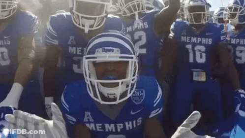 Group Of Memphis Football Players In Blue Uniforms GIF