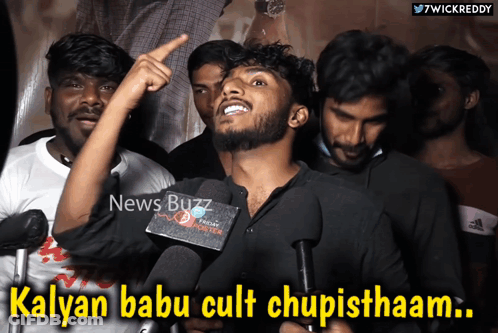 Group Of Men Around Man With Microphone GIF