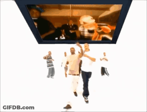 Group Of Men Dancing In Front Of Large Screen GIF