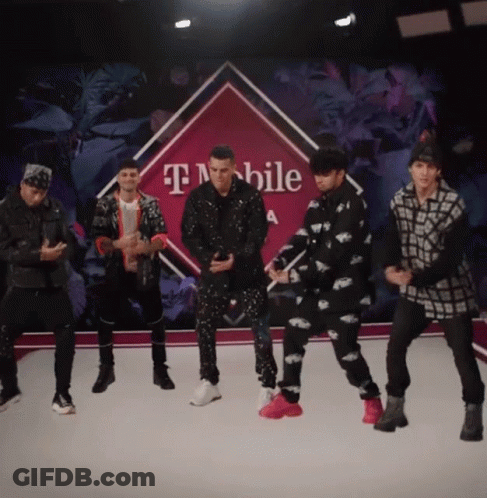 Group Of Men Dancing In Front Of T-Mobile Sign GIF