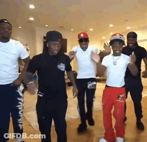 Group Of Men Dancing In Living Room GIF