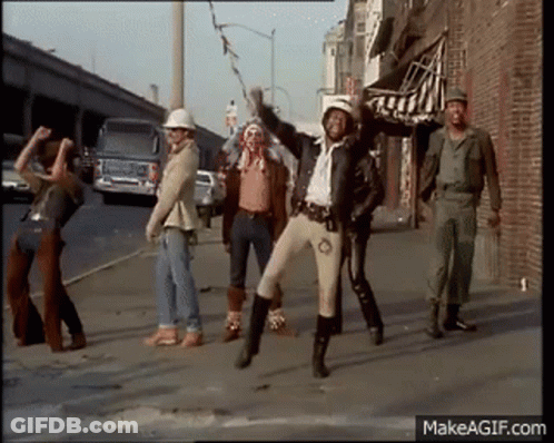 Group Of Men Dancing On Street GIF