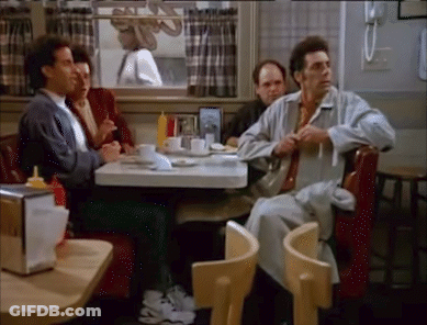 Group Of Men Eating At Diner Table GIF