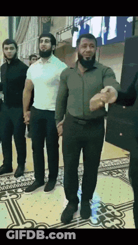 Group Of Men Holding Hands And Dancing GIF