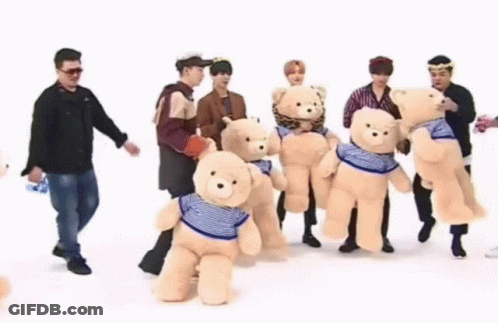 Group Of Men Holding Teddy Bears GIF