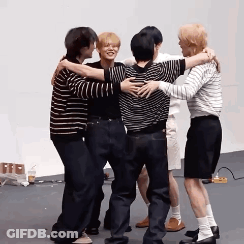 Group Of Men Hugging In Circle GIF