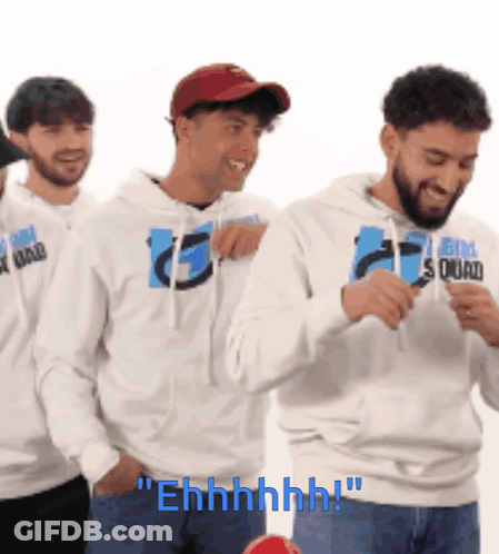 Group Of Men In Big Squad Sweatshirts Standing In Line GIF
