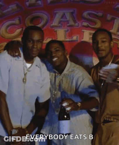 Group Of Men In Front Of Everybody Eats Sign GIF