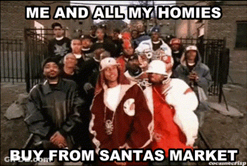 Group Of Men In Front Of Fence Saying Me And All My Homies Buy From Santas Market GIF