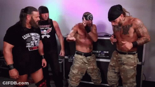 Group Of Men In Front Of Instinct Case GIF