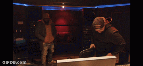 Group Of Men In Front Of Laughterhouse Logo GIF