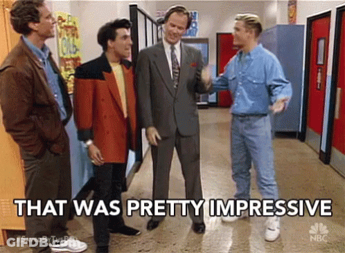 Group Of Men In Hallway Saying That Was Pretty Impressive GIF
