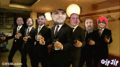Group Of Men In Suits Holding Glasses GIF