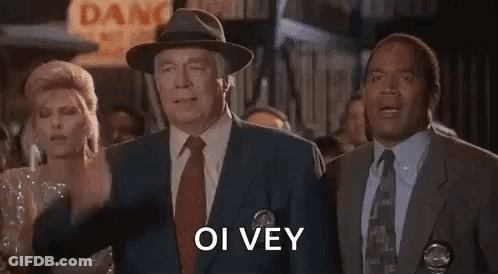 Group Of Men In Suits Standing Together GIF