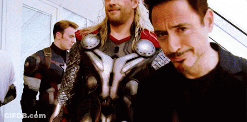 Group Of Men In Superhero Costumes GIF