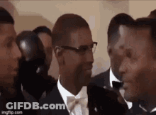 Group Of Men In Tuxedos And Bow Ties GIF