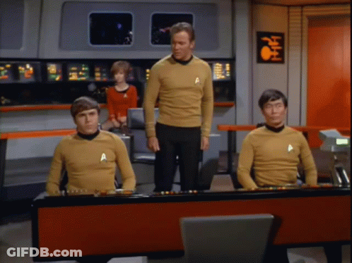 Group Of Men In Yellow Shirts With A GIF