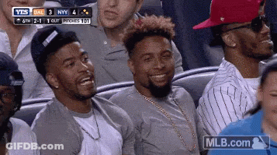 Group Of Men Laughing In Stadium GIF
