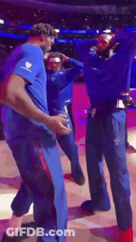 Group Of Men On Basketball Court GIF