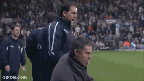 Group Of Men On Soccer Field With Emirates Shirt GIF