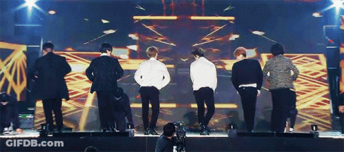 Group Of Men On Stage GIF