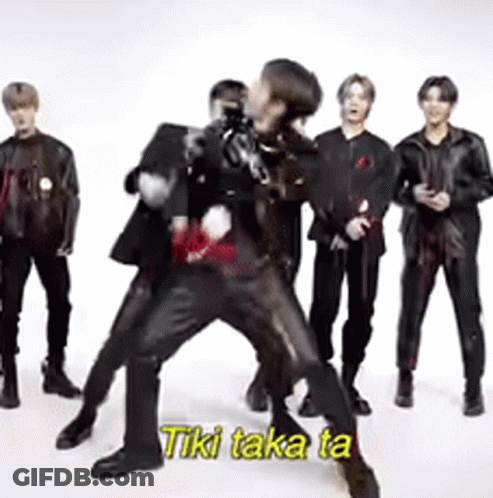 Group Of Men One Holding Another In Arms GIF