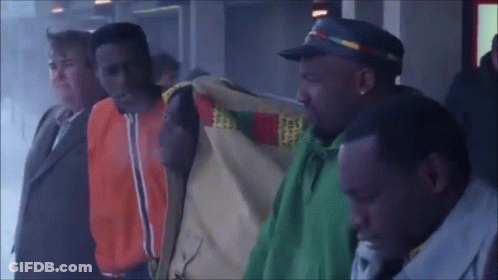 Group Of Men One In Green Jacket GIF