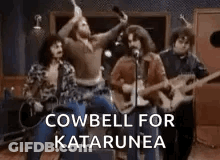 Group Of Men Playing Guitars And Singing In A Band GIF