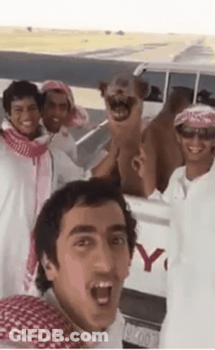 Group Of Men Posing For Selfie In Front Of Toyota Truck GIF