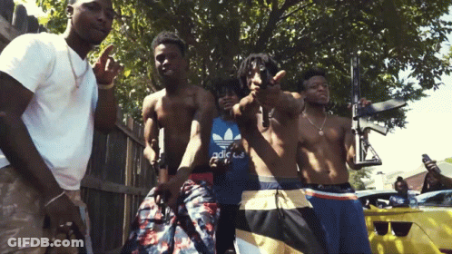 Group Of Men Posing One In Blue Adidas Shirt GIF