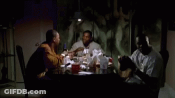 Group Of Men Sitting Around Table With Wine GIF
