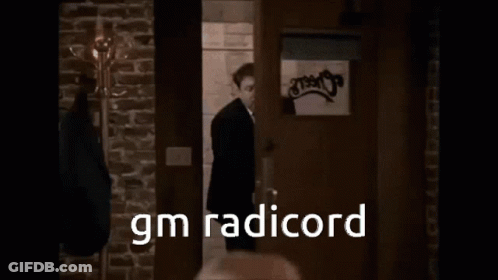 Group Of Men Sitting At Bar GIF