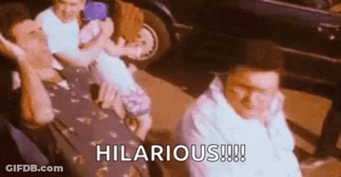 Group Of Men Sitting In Front Of Car Saying Hilarious GIF