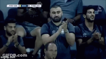 Group Of Men Sitting In Stadium Clapping GIF