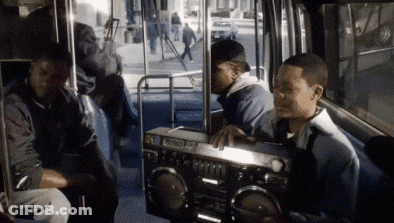 Group Of Men Sitting On Bus With Boombox GIF