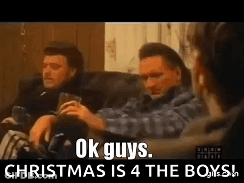 Group Of Men Sitting On Couch One Holding Drink GIF