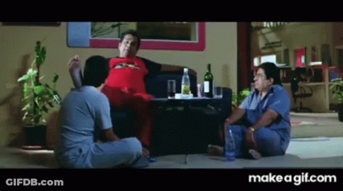 Group Of Men Sitting On Floor Talking GIF