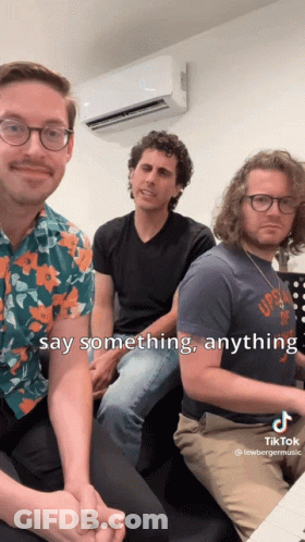 Group Of Men Sitting, One Says Something Anything GIF