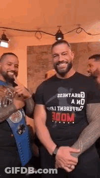 Group Of Men Smiling For Camera GIF