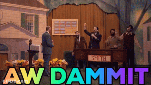 Group Of Men Standing Around Table Saying Smith GIF