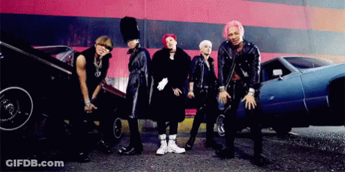 Group Of Men Standing Beside Blue Car GIF