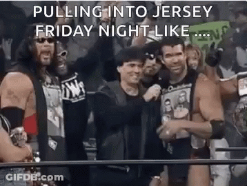 Group Of Men Standing In A Ring GIF