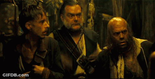 Group Of Men Standing In Dark Room GIF
