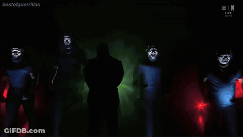 Group Of Men Standing In Front Of Bestofgmanlinks Screen GIF